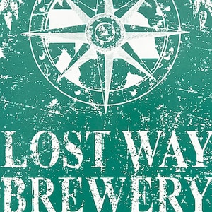 May include: A distressed teal green sign with white text that reads "Lost Way Brewery". A compass with a white background and black lines is in the upper left corner of the sign.