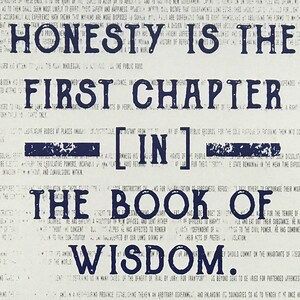 May include: A blue and white typography print with the text "Honesty is the first chapter in the book of wisdom".