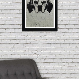 May include: Black and white illustration of a dog's head in a black frame against a white brick wall. The dog has floppy ears and a serious expression.