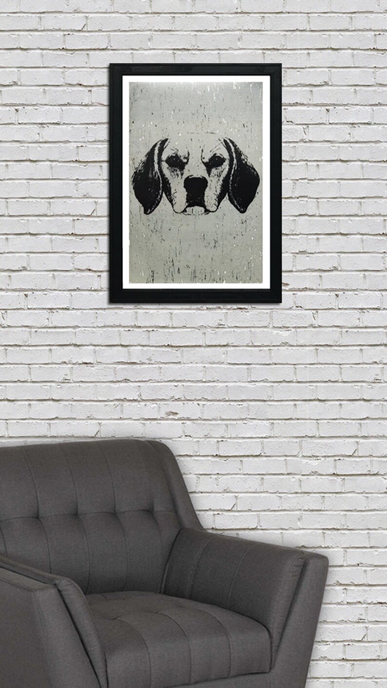 May include: Black and white illustration of a dog's head in a black frame against a white brick wall. The dog has floppy ears and a serious expression.