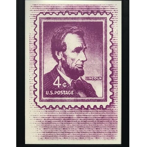 May include: A vintage-style 4&cent; US postage stamp featuring a portrait of Abraham Lincoln in purple. The stamp has a white background and the text "LINCOLN" and "U.S. POSTAGE" are printed in white.