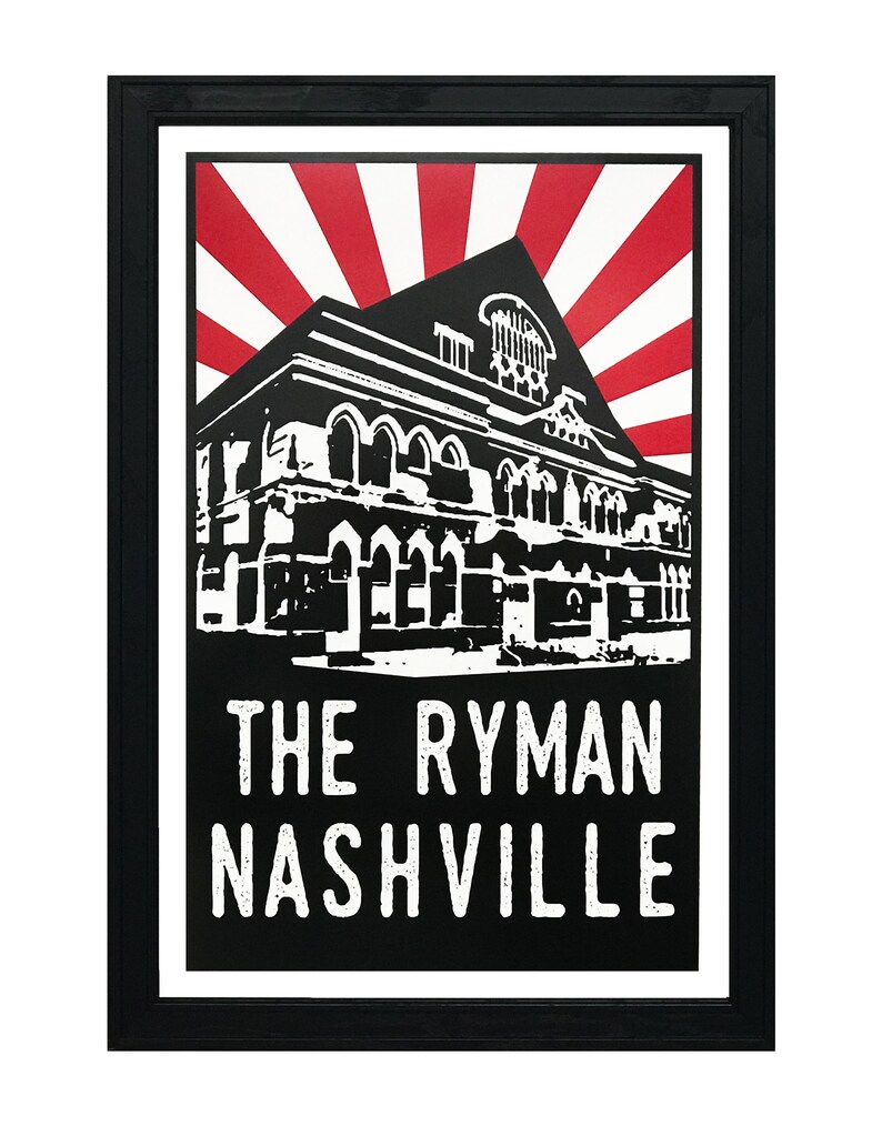 May include: Black and white illustration of the Ryman Auditorium in Nashville, Tennessee. The building is depicted in a vintage style with a red and white sunburst behind it. The text "The Ryman Nashville" is printed below the building.