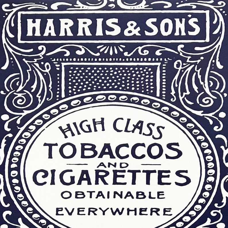 May include: A vintage advertisement for Harris & Sons High Class Tobaccos and Cigarettes. The ad features a white circle with black text on a dark blue background with ornate white designs.