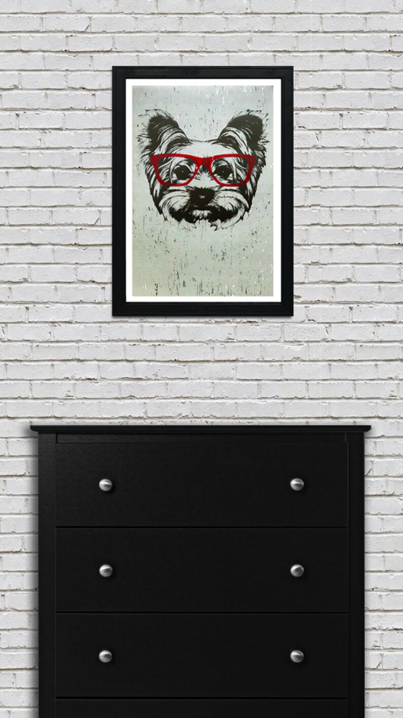 May include: A black and white illustration of a dog wearing red glasses. The dog's fur is textured and the background is a light gray color.