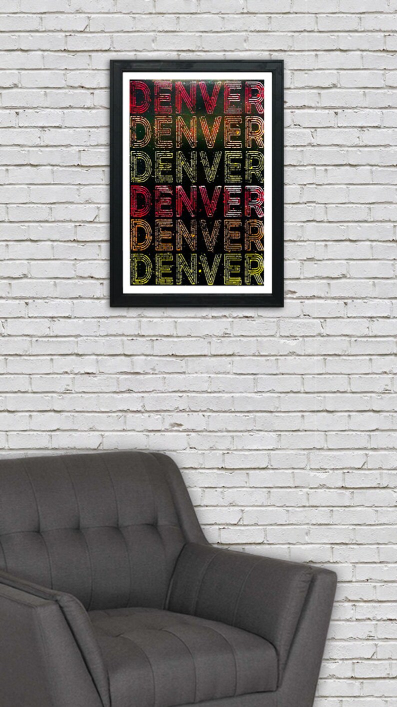 May include: A framed print with the word "DENVER" repeated five times in a retro, colorful font. The background is black with a subtle, glittery texture.