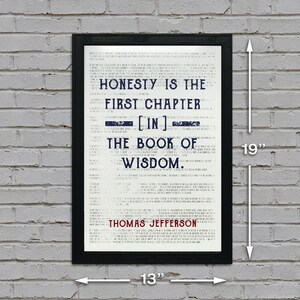 May include: A framed print with the quote "Honesty is the first chapter in the book of wisdom" by Thomas Jefferson. The black frame surrounds a white background with dark blue and red text. The print measures 19 inches high and 13 inches wide.
