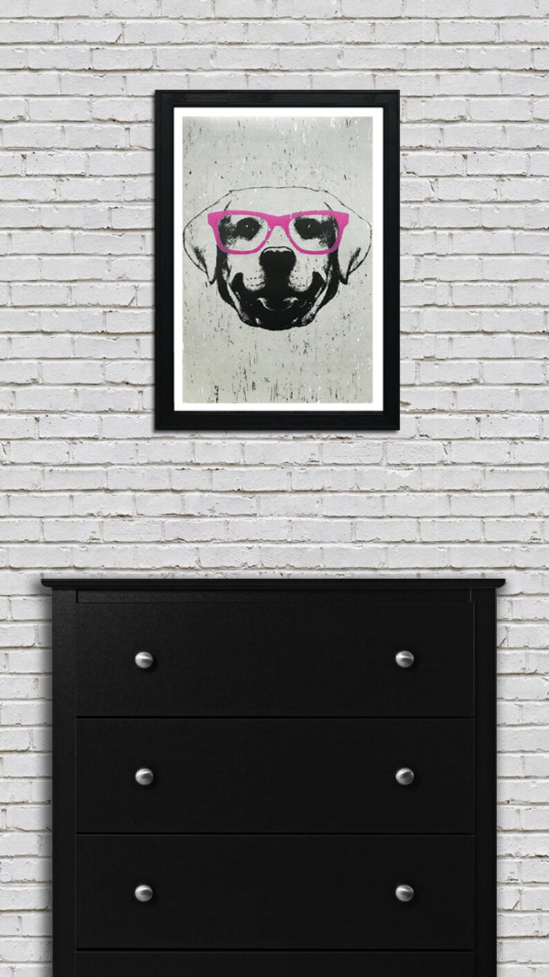 May include: A black and white illustration of a dog wearing pink glasses. The dog's face is the focus of the image, and the background is a light gray.