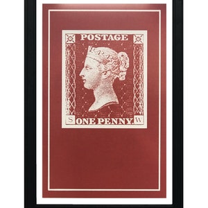 May include: A framed print of a vintage postage stamp featuring a profile of Queen Victoria with the text "POSTAGE ONE PENNY."