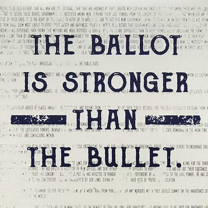 May include: A black and white image with a blue text overlay. The text reads "The Ballot is Stronger Than The Bullet."