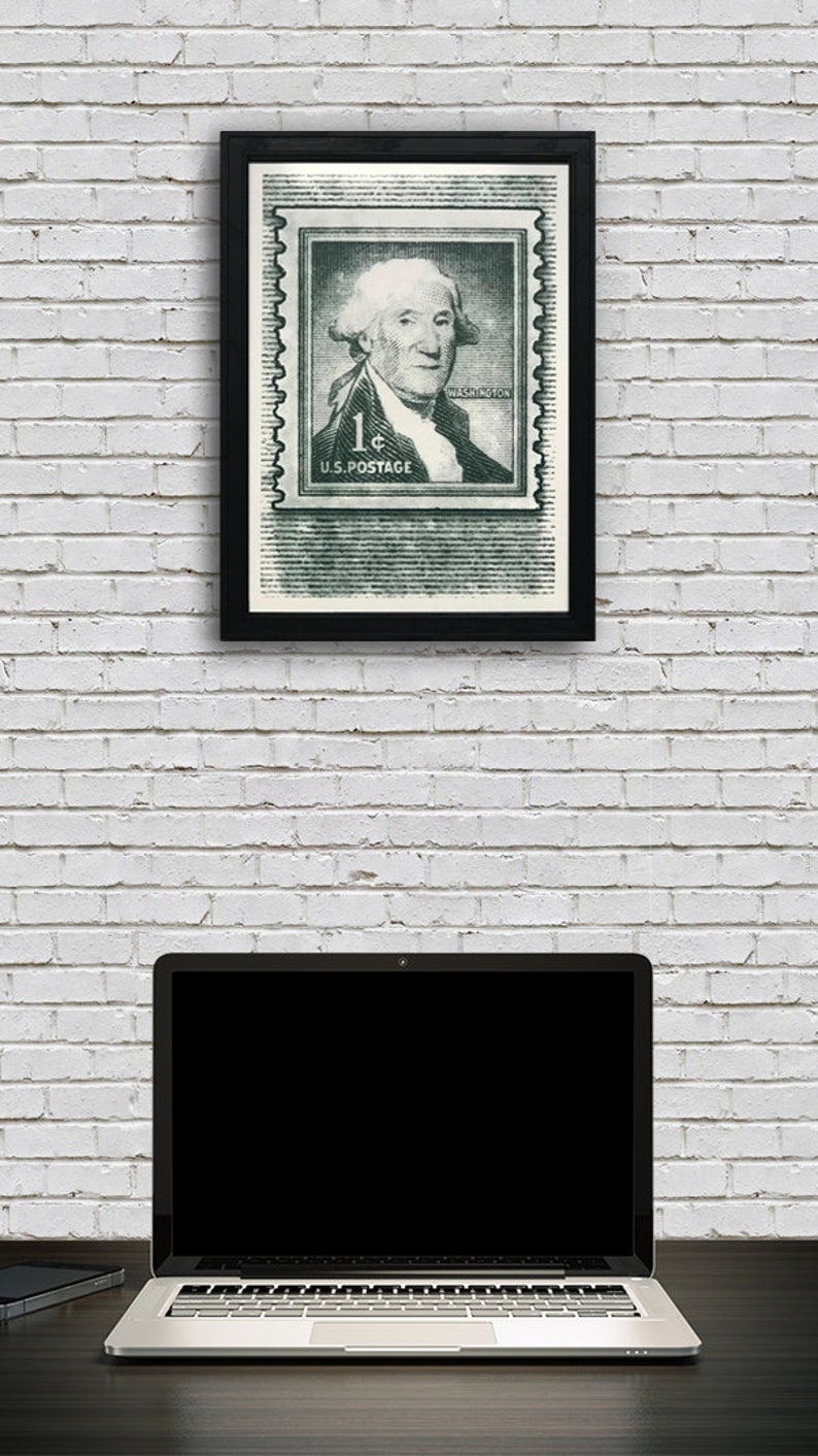 May include: A framed black and white print of a vintage US postage stamp featuring George Washington. The stamp is green and has the text "1&cent; U.S. POSTAGE" and "WASHINGTON".