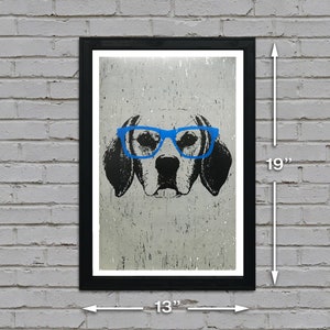 May include: A black and white illustration of a dog wearing blue glasses. The dog is looking directly at the viewer. The image is printed on a textured background and framed in a black frame. The frame is 13 inches wide and 19 inches tall.