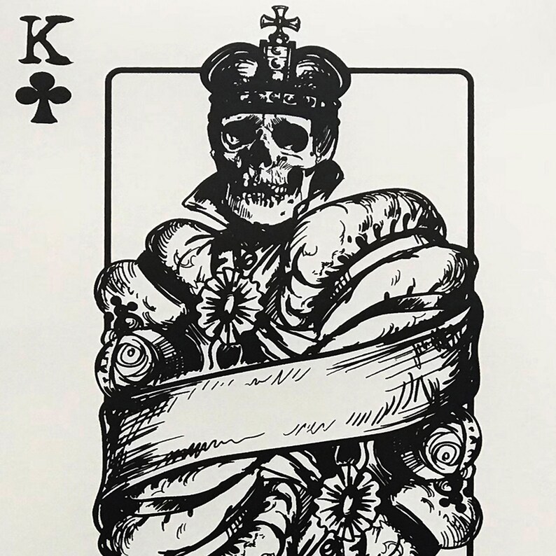 May include: Black and white illustration of the King of Clubs playing card. The King is depicted as a skull wearing a crown and a robe. The card is surrounded by a white border.