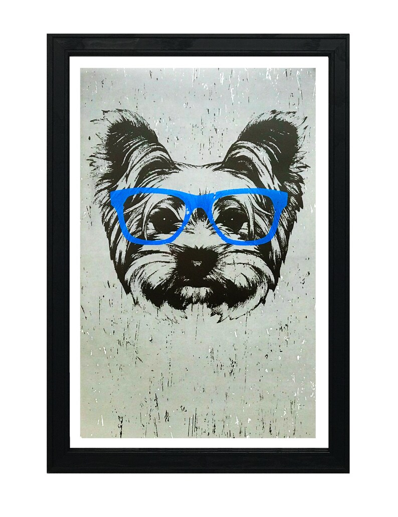 May include: A black and white illustration of a Yorkshire Terrier wearing blue glasses against a gray textured background. The image is framed in black.