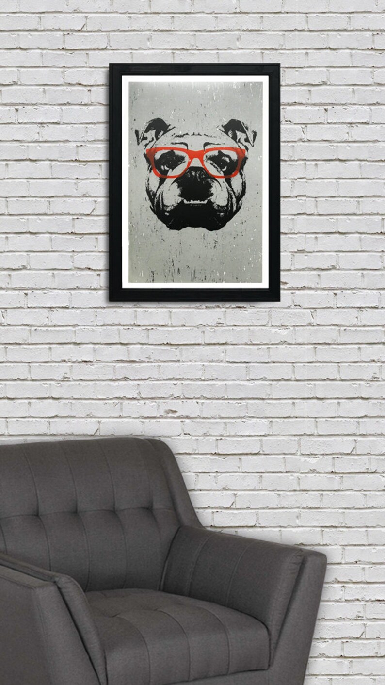 May include: A black and white illustration of a bulldog wearing red glasses. The bulldog's face is the focus of the image, with the background being a light gray.