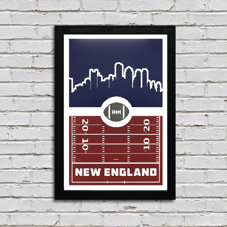 May include: A navy blue and red print with a white silhouette of the Boston skyline. The print features a football field with the words "NEW ENGLAND" at the bottom.