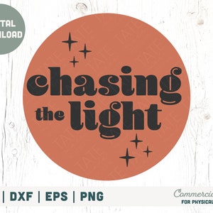 May include: A digital download of a graphic design featuring a peach-colored circle with the text "chasing the light" in black, retro-style font. The design also includes small, stylized stars.
