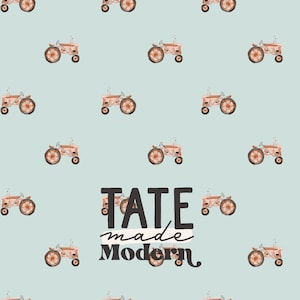 May include: A light blue background with a repeating pattern of orange tractors. The text "TATE made Modern" is in the center of the image.
