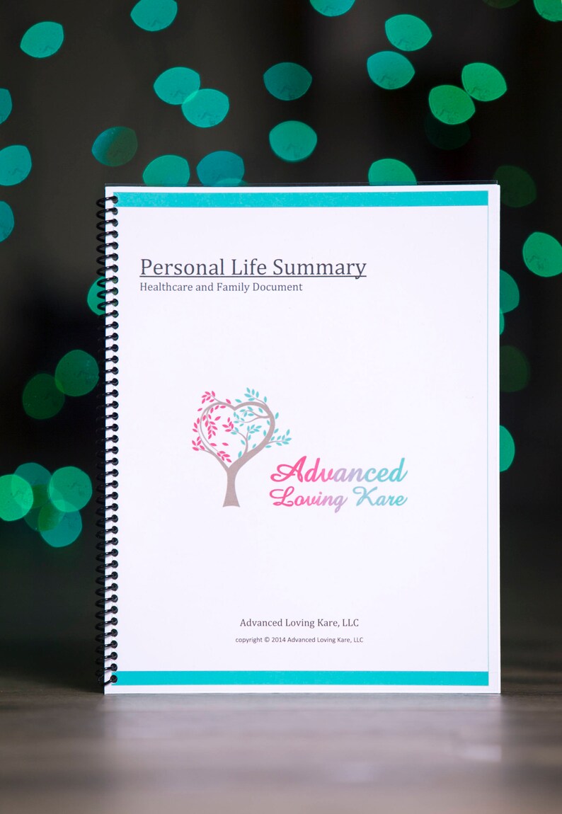 May include: A white spiral bound book with a teal border. The cover features a pink and blue heart-shaped tree with the text "Advanced Loving Kare" in a cursive font. The text "Personal Life Summary" and "Healthcare and Family Document" are printed at the top of the cover. The text "Advanced Loving Kare, LLC" and "copyright &copy; 2014 Advanced Loving Kare, LLC" are printed at the bottom of the cover.
