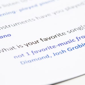 May include: A close-up of a survey question asking "What is your favorite song(s)?" with a list of artists including Diamond, Josh Grobin, and Adele. The question is numbered 34.