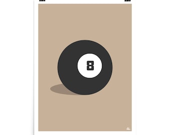 Puede incluir: Una bola de billar negra y blanca sobre un fondo beige. La bola 8 es una bola de billar clásica con un número 8 blanco sobre fondo negro.