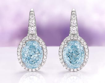 Pendientes colgantes de aguamarina con halo ovalado de diamantes simulados creados en laboratorio y plata de ley.
