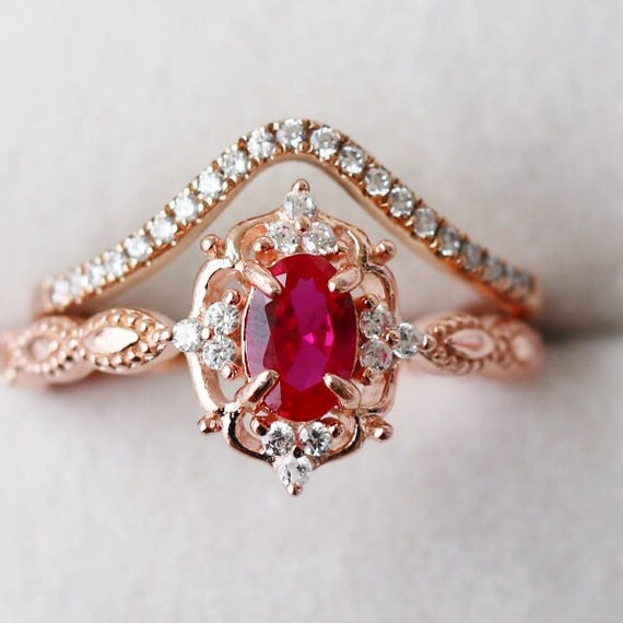 GIA Certified Vivid Red Pigeon Blood Ruby with Pear Diamond Sides in Yellow  Gold Engagement Ring