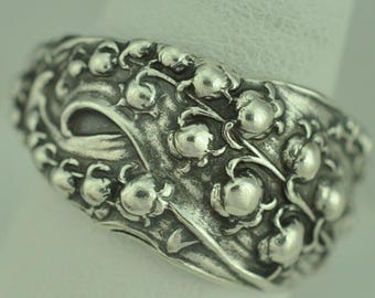 Anel ajustável em prata de lei 925 maciça com flor de lírio-do-vale - Disponível em diferentes materiais.
