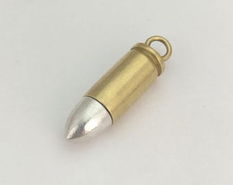 Colgante de medallón con rosca de bala de 9 mm en plata de ley 925 de Melusina.