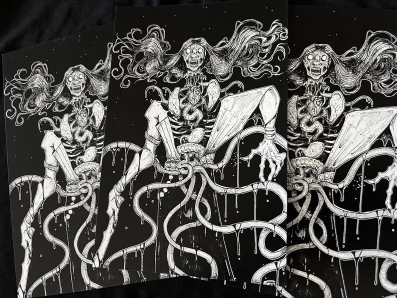 May include: A black and white art print featuring a detailed ink illustration of a supernatural creature with long flowing hair, exposed skeletal ribcage, internal organs, and elongated limbs, surrounded by dripping tentacle-like appendages.