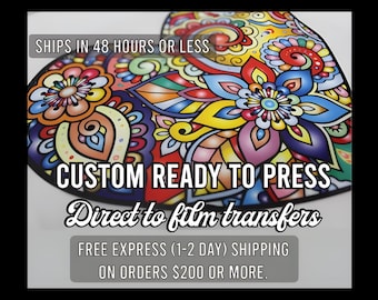 May include: A heart-shaped graphic featuring a vibrant, multi-colored floral and paisley pattern. The design includes text that reads SHIPS IN 48 HOURS OR LESS, CUSTOM READY TO PRESS, Direct to film transfers, and FREE EXPRESS (1-2 DAY) SHIPPING ON ORDERS $200 OR MORE.
