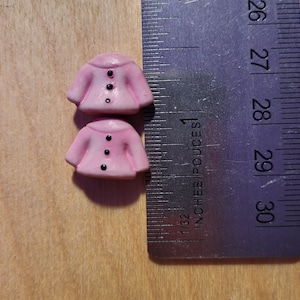2 Miniature dollhouse pink coats with black buttons, ceramic