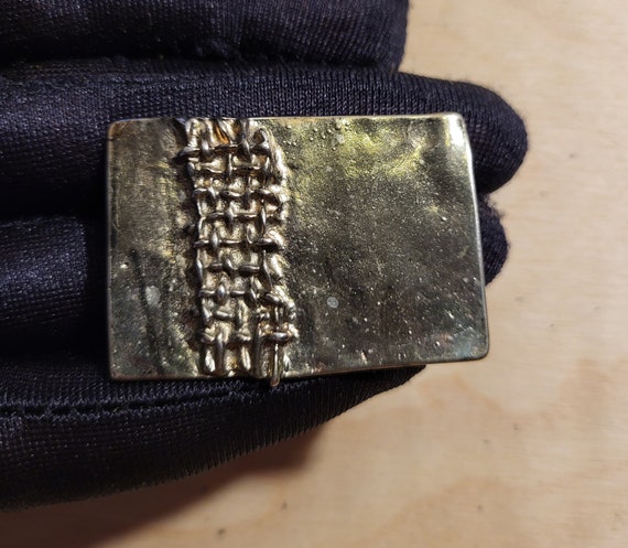 Flat rectangular silver-tone brooch with tire tre… - image 3