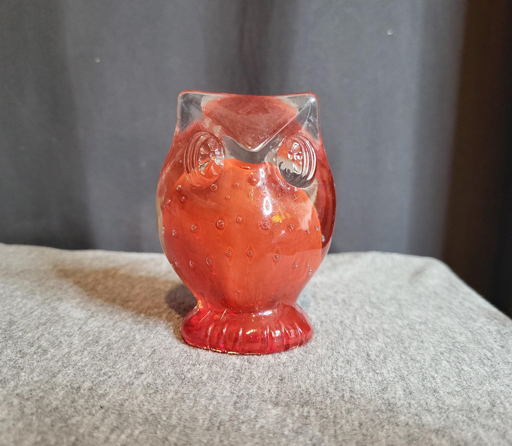 Vintage red and translucent blown glass owl figurine with controlled bubbles