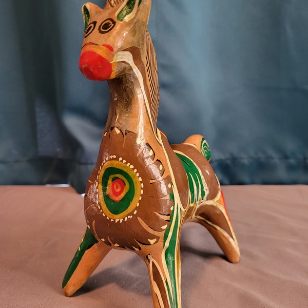 Vintage Mexican terra cotta horse piggy bank with floral designs in red, green, white and brown