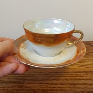 Vintage Lusterware Tea Cup and Saucer: Orange Pearl KMP Czechoslovakia