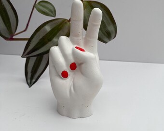 Handmade ‘peace sign’ ring holder. Ceramic sculpture