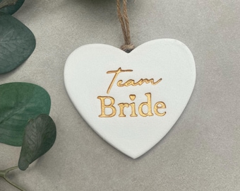 White Heart "Team Bride" Hanging Sign – Gold Lettering, Rustic Twine Bridal Decoration