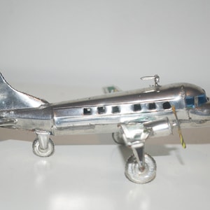 Stylish Vintage Perrier Tin Can Made Air Plane Ornament