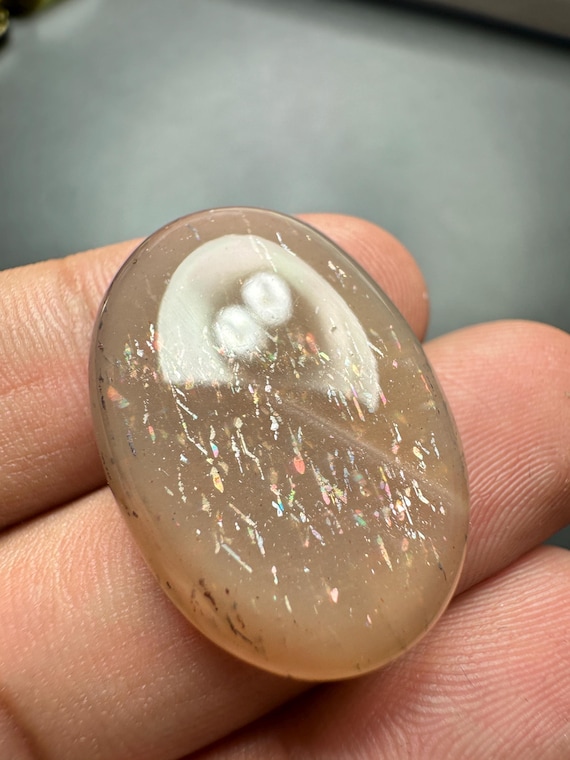 Rainbow Lattice Sunstone Cabochon; Oval Shape with confetti lines 28.45 Ct, (27 x 18 mm)