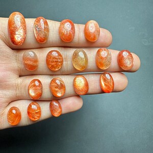 rare orange sunstone cabochon available for etsy sell