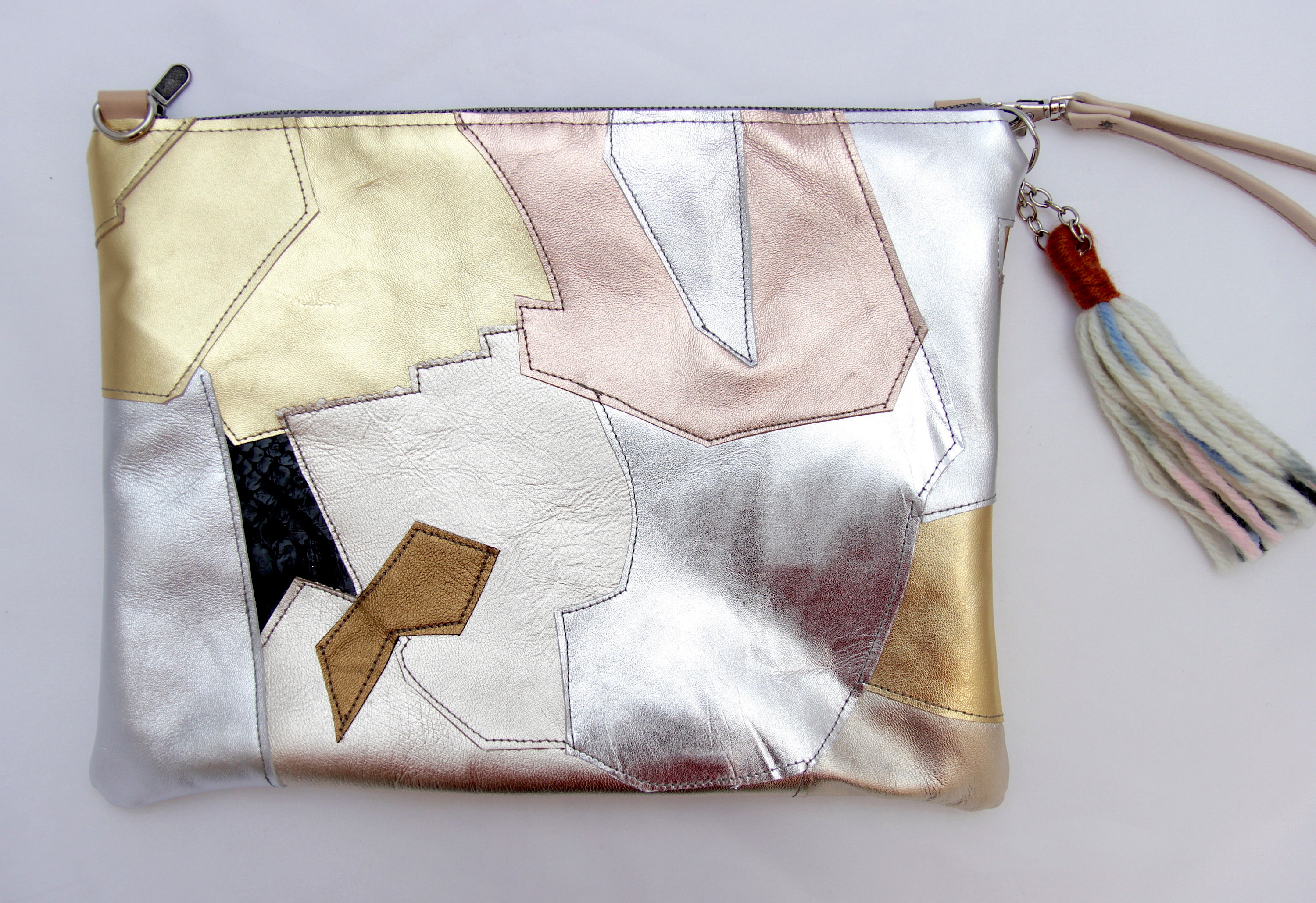 rose gold and silver clutch bag