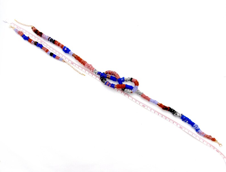 Adjustable lengths acrylic wool and cotton are braided and knotted Set Necklace and bracalet Gold-colored closures. Wool
