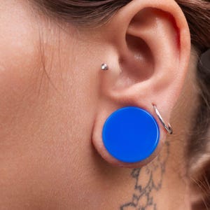 Plug auricolare in silicone blu semplice, singolo o in coppia