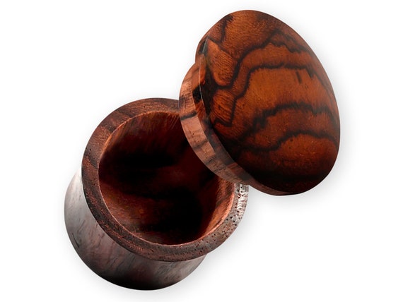Ear gauges with secret compartment clearance