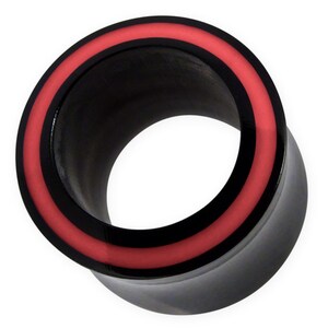 May include: Black ear gauge with a red and black inlay.