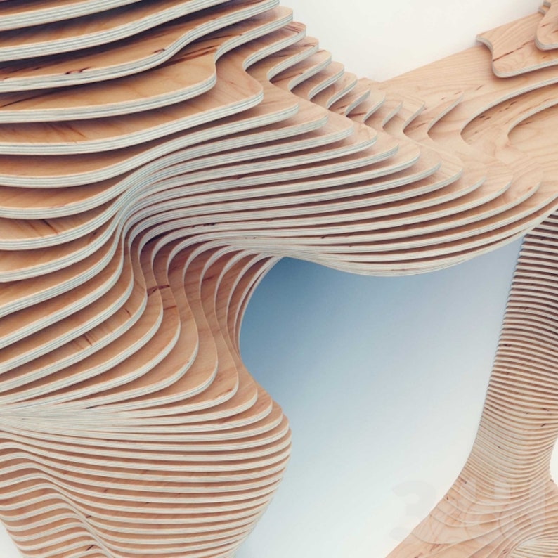 Puede incluir: Una escultura de madera con un dise&ntilde;o abstracto &uacute;nico. La escultura est&aacute; hecha de finas capas de madera que se apilan y curvan para crear una forma org&aacute;nica y fluida.