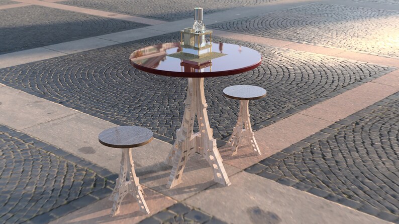 May include: A set of outdoor furniture with a round table and two Eiffel Tower-shaped stools. The table has a red top and a glass surface. The stools are made of wood and have a natural finish.