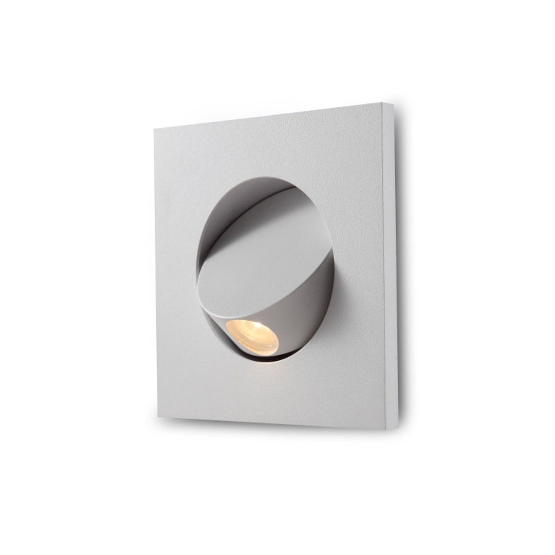 Recessed reading light over cheap bed