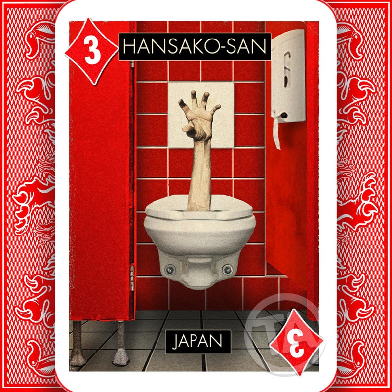 May include: Playing card depicting a bathroom scene with a hand emerging from a toilet. The card is red and white with the number 3 and the text "HANSAKO-SAN" and "JAPAN". The card has a diamond suit symbol.