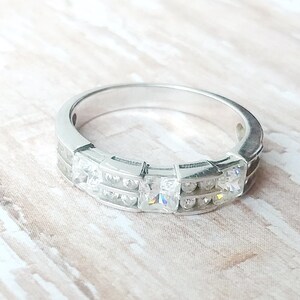 CZ Band Ring with Round and Princess Cut Stones in Sterling Silver - Size 7